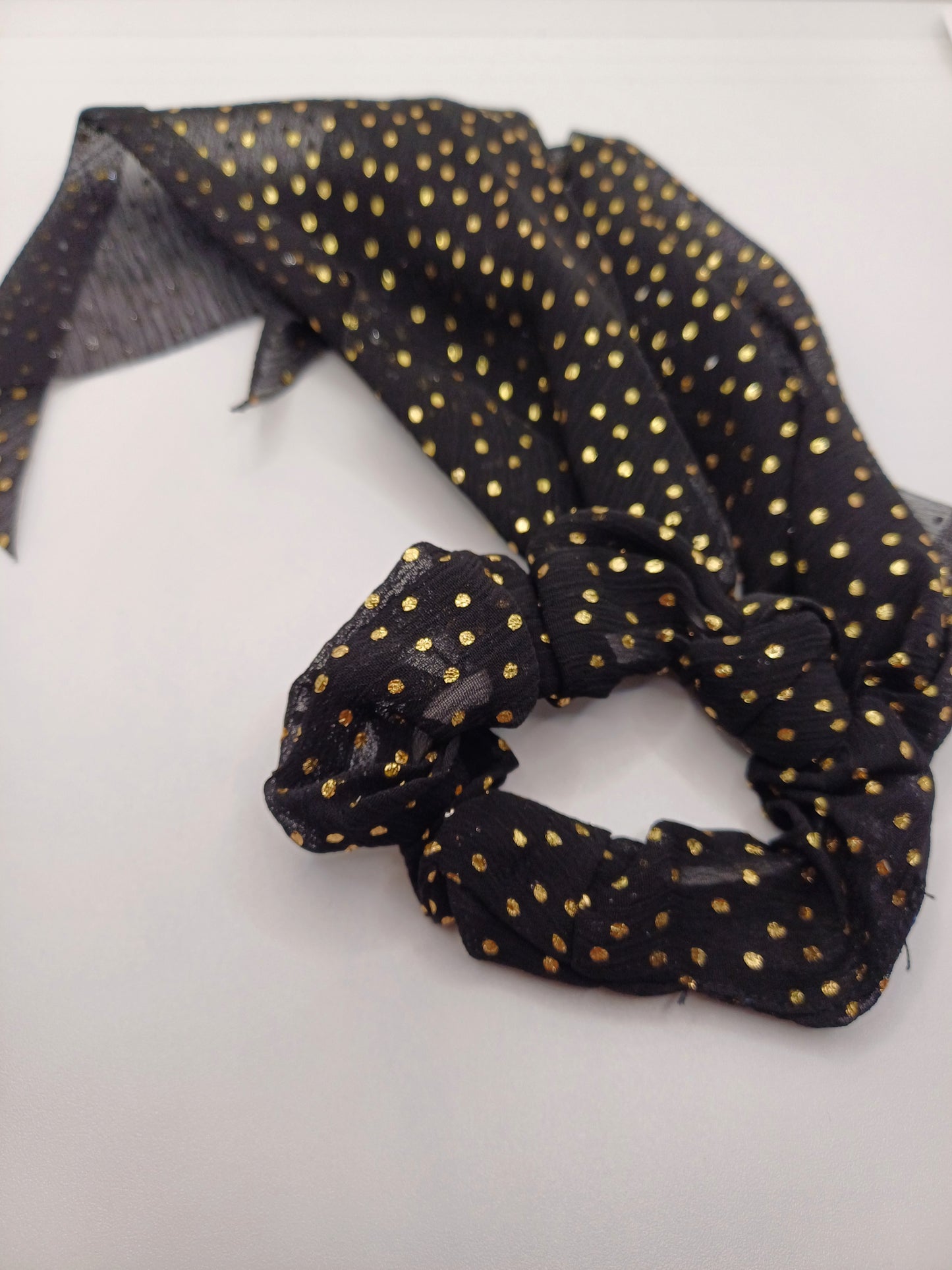 Elastico fiocco nero a pois oro